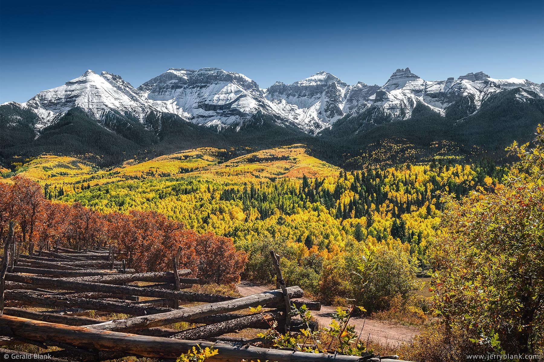 #06836 - Brilliant autumn colors on the northern foothills of Whitehouse Mountain and Mount Ridgway, San Juan Mountains, Colorado - photo by Jerry Blank