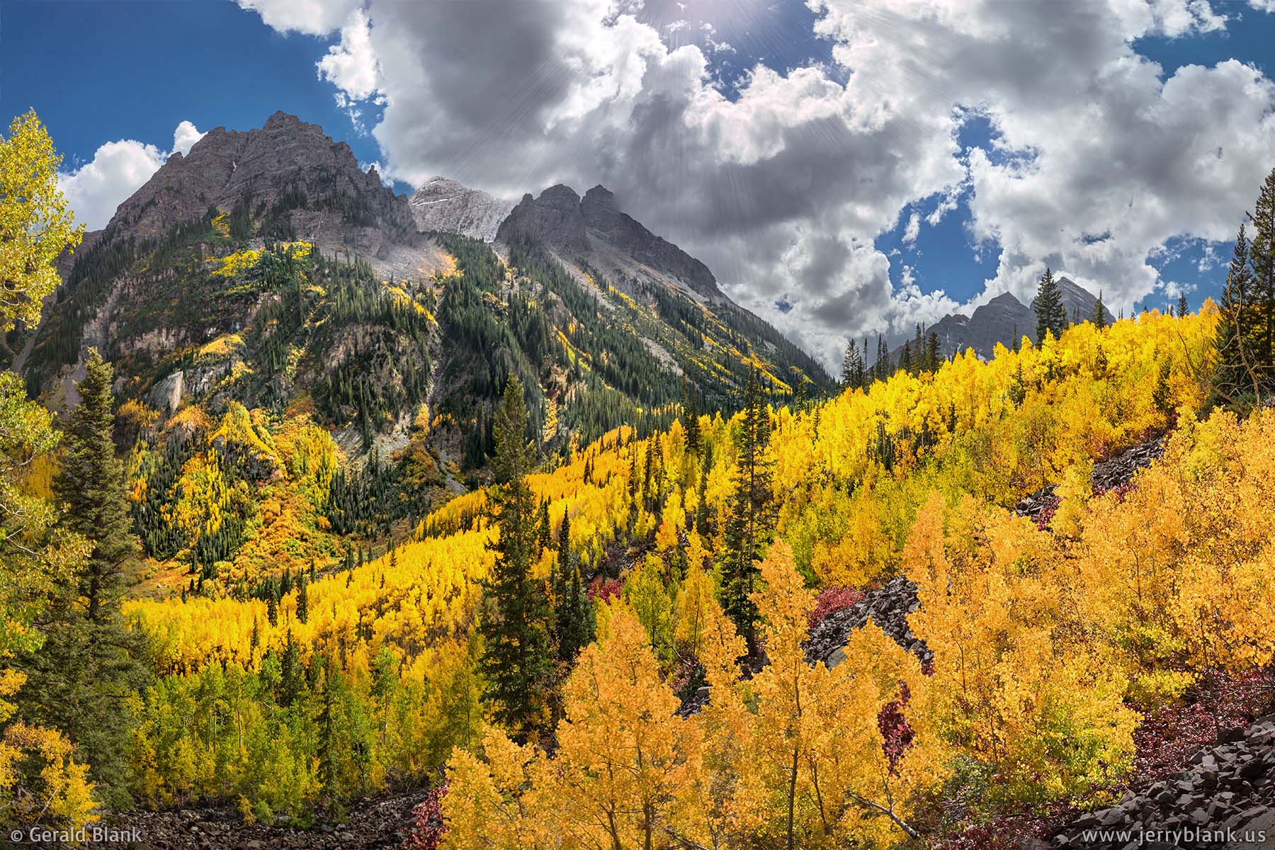 #42600 - Aspens north of Pyramid Peak are set alight by the afternoon sun, in Colorado’s Maroon-Snowmass Wilderness Area - photo by Jerry Blank