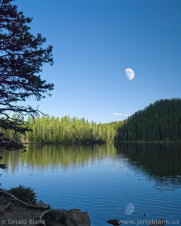 #00767 - Moonrise reflected in Fairy Lake, Bridger Mountains, Montan - photo by Jerry Blank