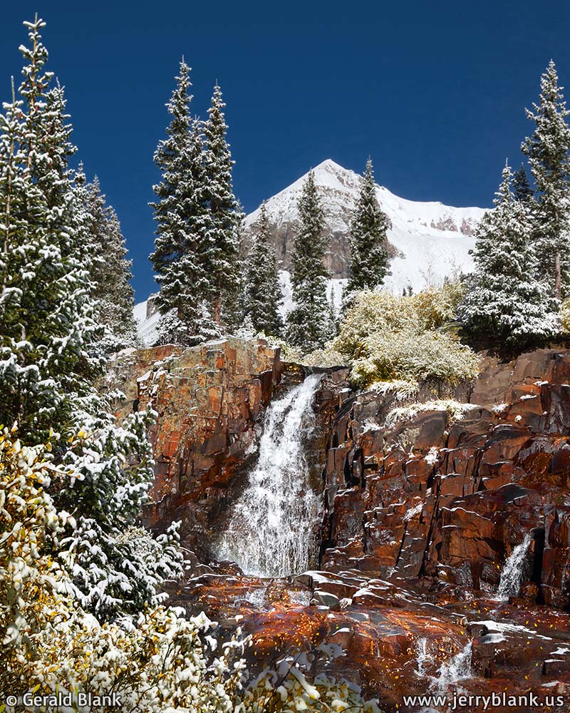 #06612 - Fresh snow covers autumn foliage around a waterfall on Sneffels Creek, in Yankee Boy Basin, Colorado, with Cirque Mountain in the background - photo by Jerry Blank